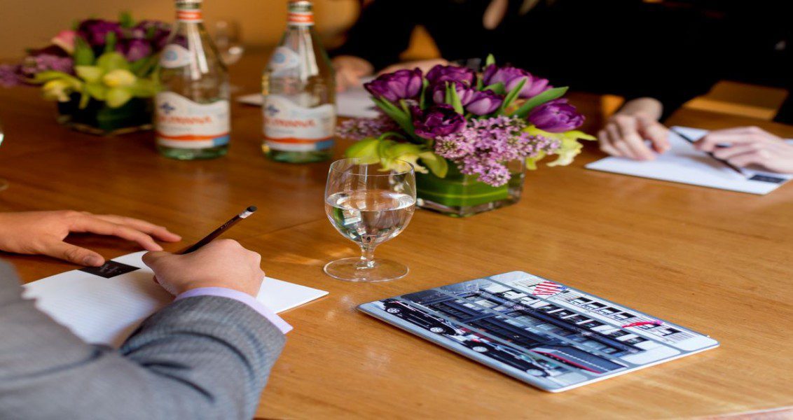 our people having a meeting in one of our parlor rooms.