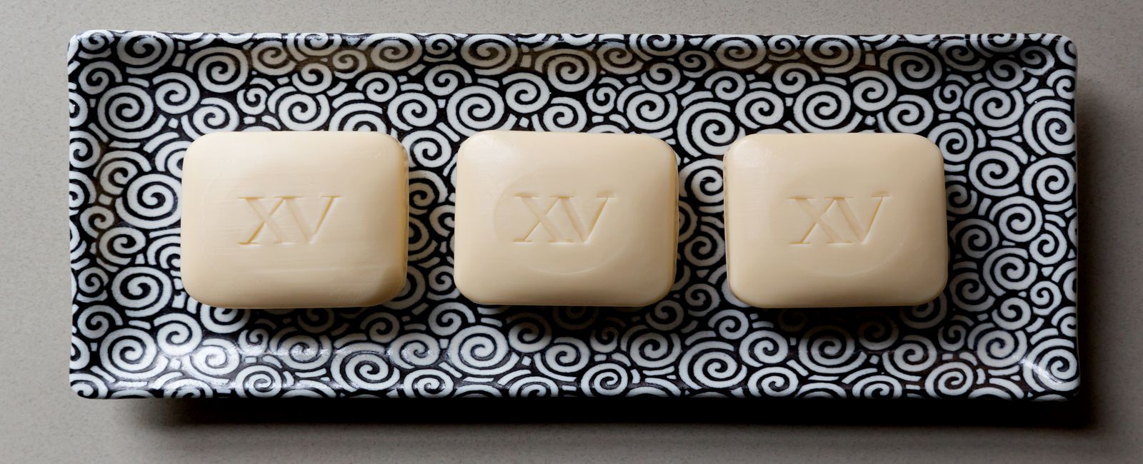 fifteen beacon branded soap bars.