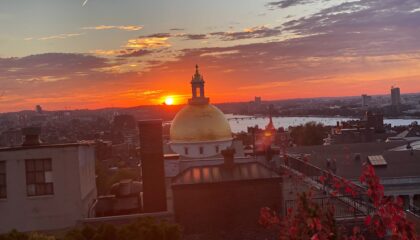XV Beacon Roof Deck with view towards the State House during the Fall Season in New England